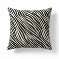 Zebra-striped pillow on a white background